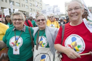  Joanne Gormley (centre) with two of the other Grandmothers to Grandmothers Campaign members who attended the South Africa Grandmothers Gathering in Durban: Elizabeth McNair (L) and Carol Little (R). By Alexis Macdonald. 